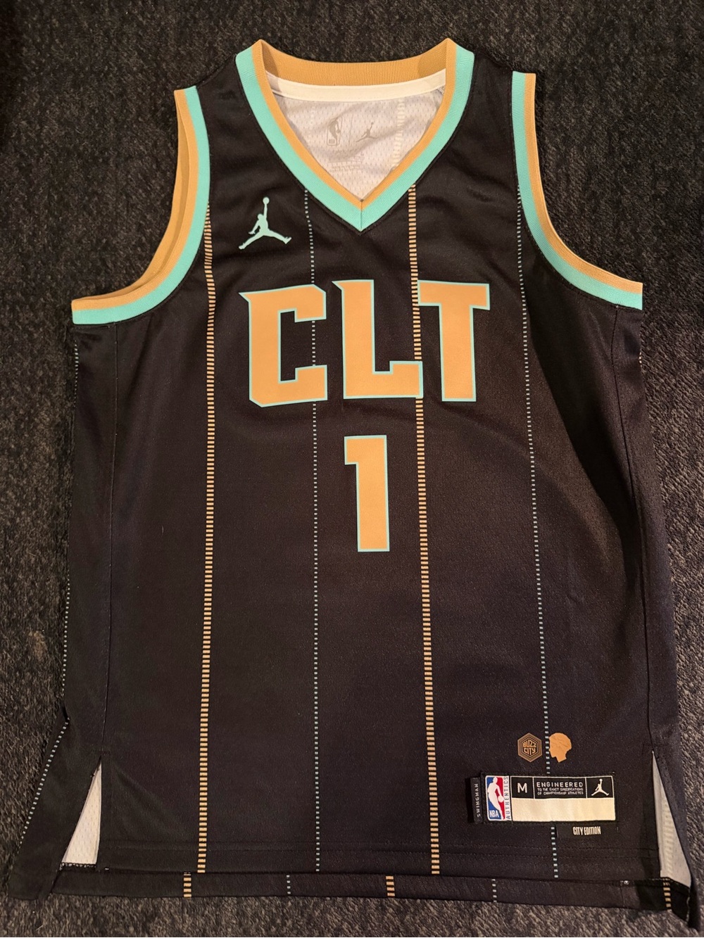 Nike Black Basketball Jersey with Teal and Gold Accents